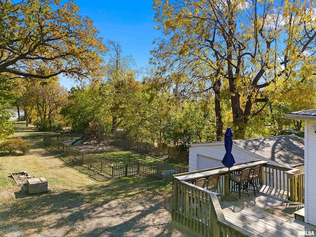 view of yard with a wooden deck