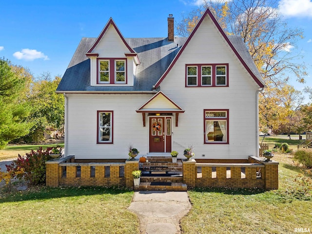 view of front facade featuring a front yard