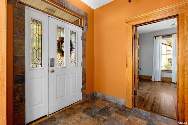 entryway featuring dark wood-type flooring