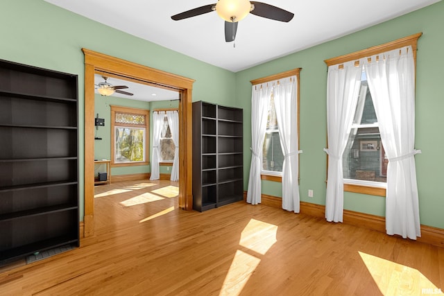 interior space featuring light hardwood / wood-style flooring and ceiling fan