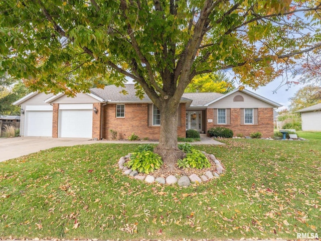 ranch-style home with a front yard and a garage