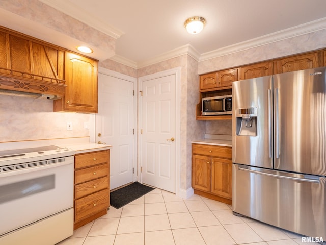 kitchen featuring light tile patterned flooring, ornamental molding, and appliances with stainless steel finishes