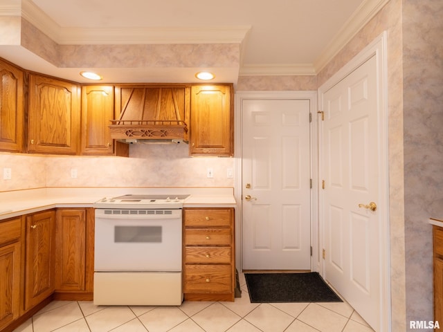 kitchen featuring white range oven, crown molding, light tile patterned flooring, and custom range hood