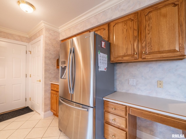 kitchen with stainless steel fridge with ice dispenser, crown molding, and light tile patterned floors