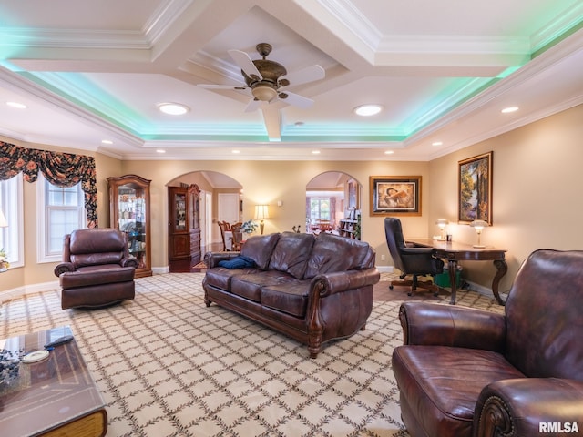 carpeted living room featuring crown molding, a wealth of natural light, and coffered ceiling