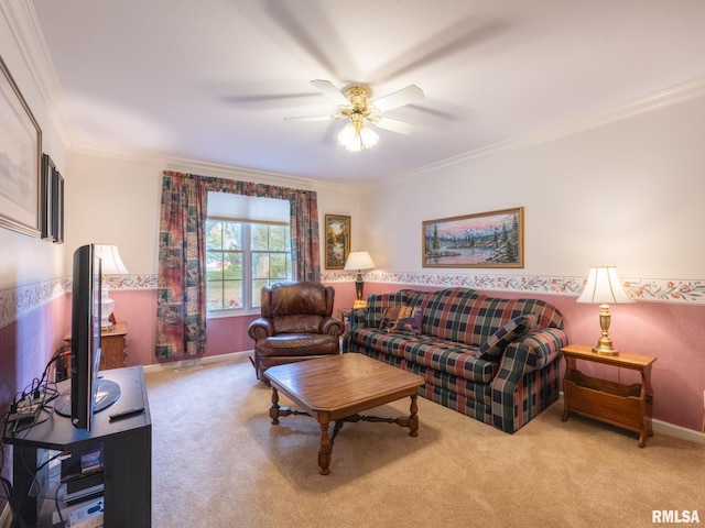 carpeted living room with ceiling fan and crown molding