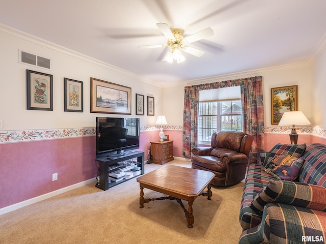 living room with light colored carpet, ceiling fan, and crown molding