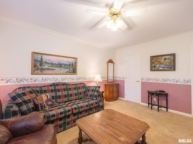 carpeted living room with ceiling fan and ornamental molding