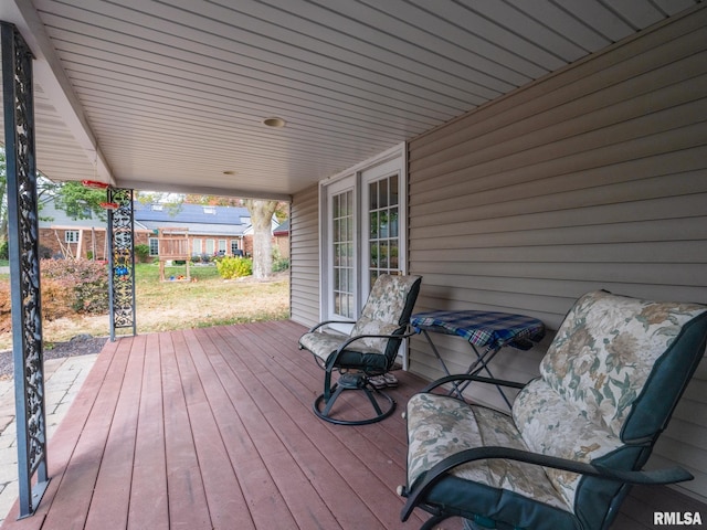 wooden terrace with covered porch