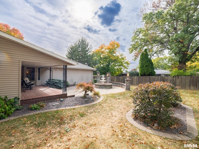 view of yard with a deck