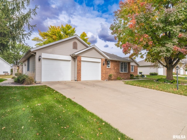 ranch-style home featuring a front yard and a garage