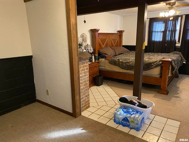 bedroom featuring ceiling fan and light colored carpet