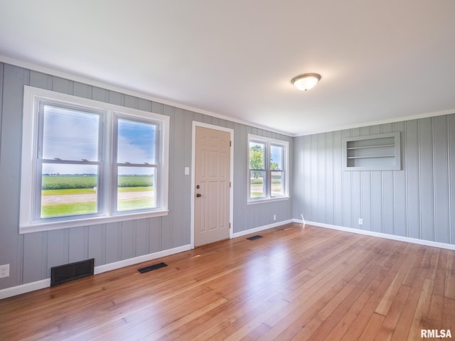 entrance foyer featuring light hardwood / wood-style flooring