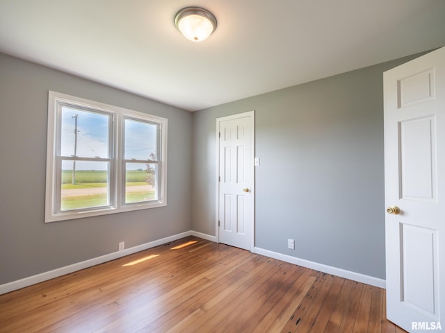 unfurnished bedroom featuring light hardwood / wood-style floors