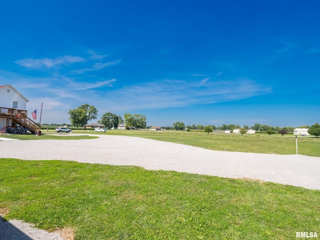 surrounding community featuring a yard