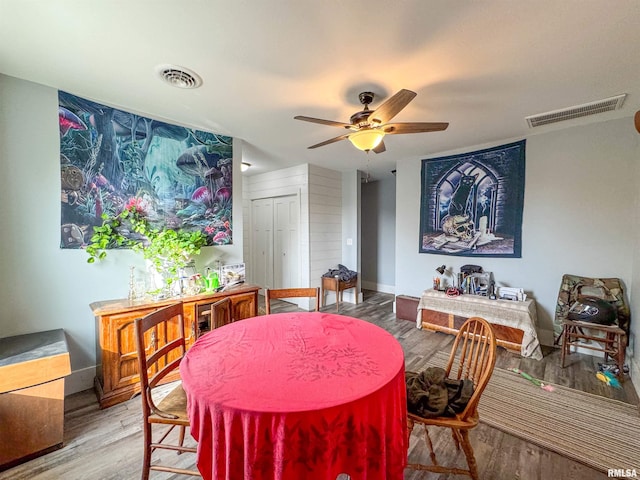 dining room featuring hardwood / wood-style flooring and ceiling fan