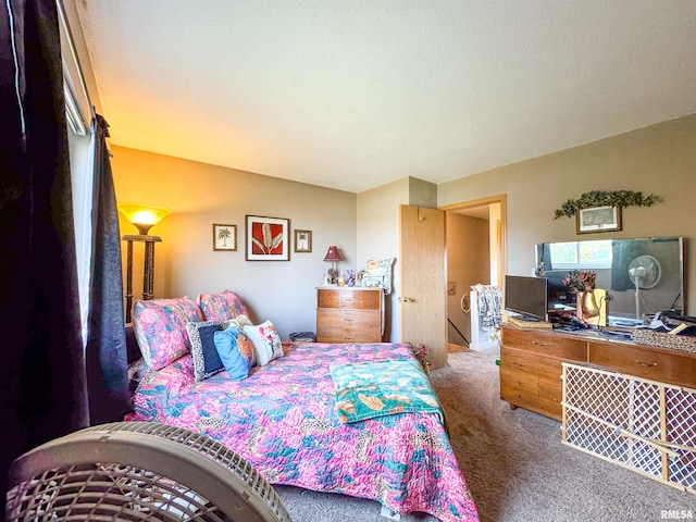 bedroom featuring carpet flooring