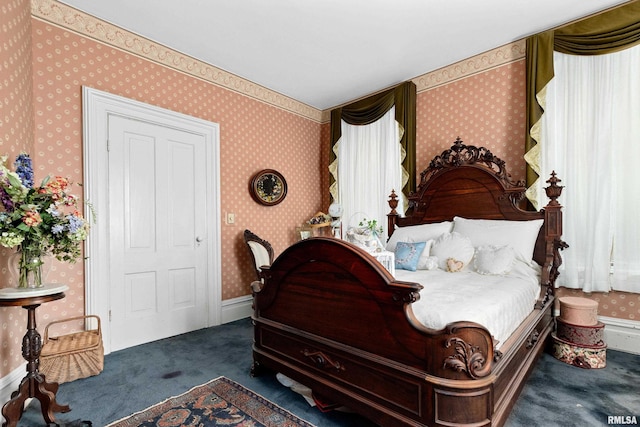 bedroom featuring dark colored carpet