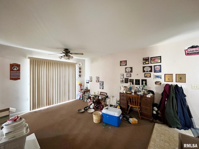 misc room featuring carpet and ceiling fan