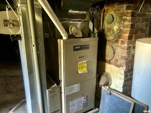 utility room with water heater