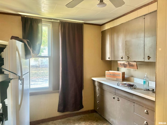 kitchen featuring white fridge and ceiling fan