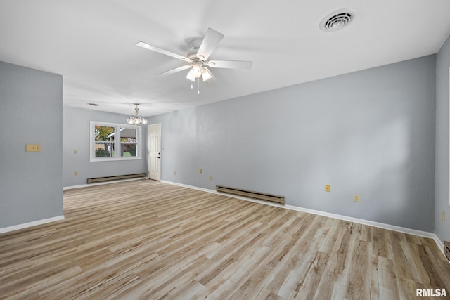 unfurnished room with a baseboard heating unit, ceiling fan with notable chandelier, and light wood-type flooring