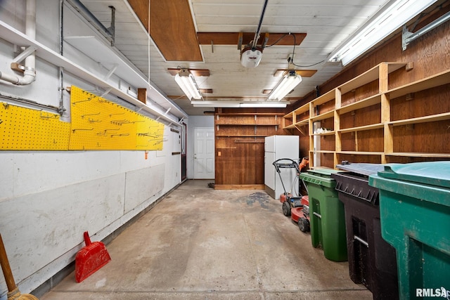 garage featuring white refrigerator