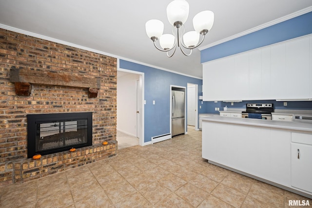 kitchen with a brick fireplace, a baseboard radiator, stainless steel appliances, white cabinetry, and decorative light fixtures