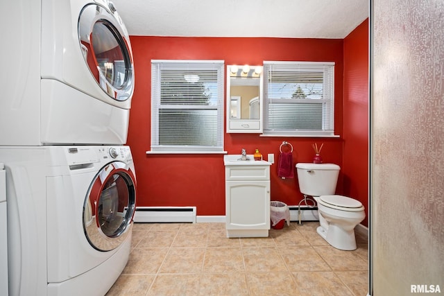 laundry room with a baseboard radiator, light tile patterned floors, sink, and stacked washer and clothes dryer