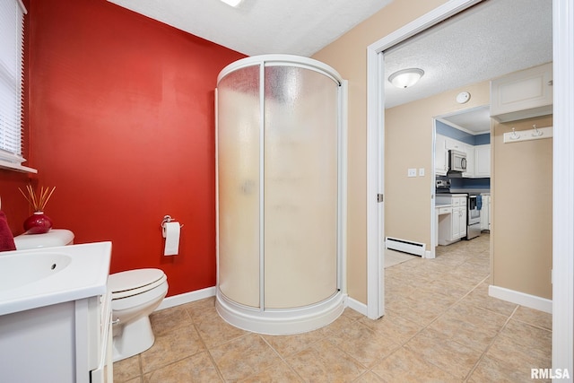 bathroom with toilet, an enclosed shower, vanity, and a baseboard heating unit