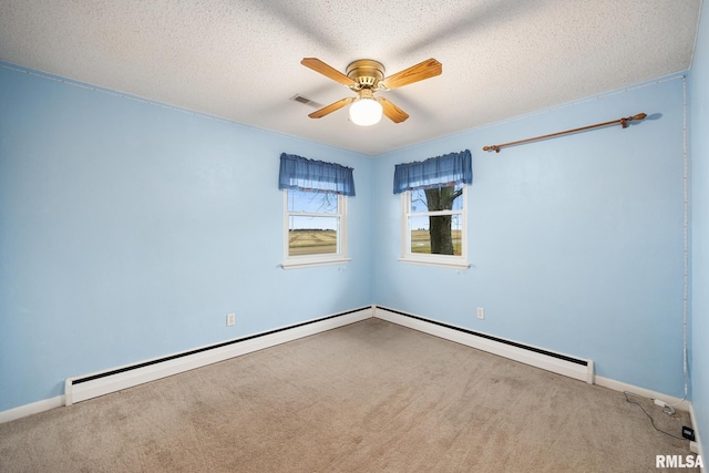 unfurnished room featuring baseboard heating, carpet, a textured ceiling, and ceiling fan