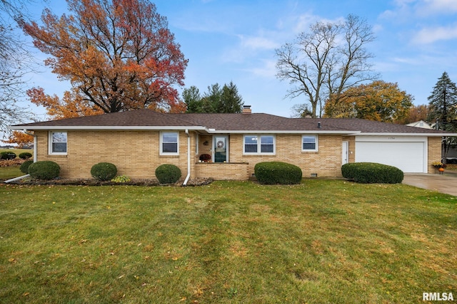 ranch-style house with a garage and a front lawn