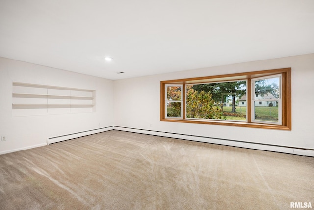 unfurnished room with a wealth of natural light and carpet floors