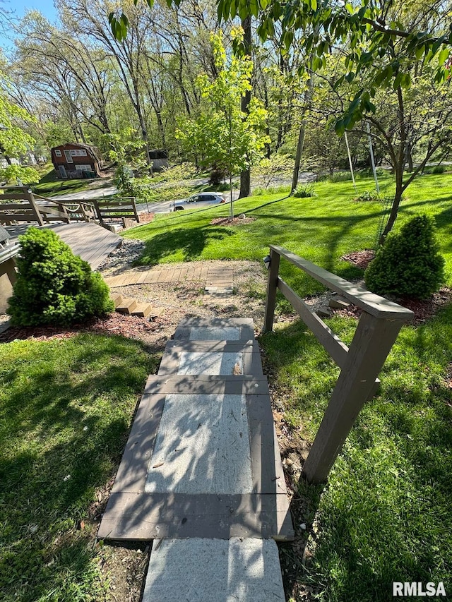 surrounding community featuring a lawn