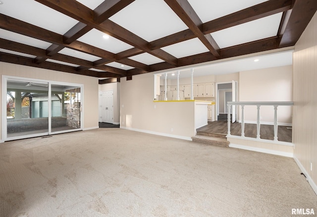 unfurnished living room with beamed ceiling, carpet flooring, and coffered ceiling