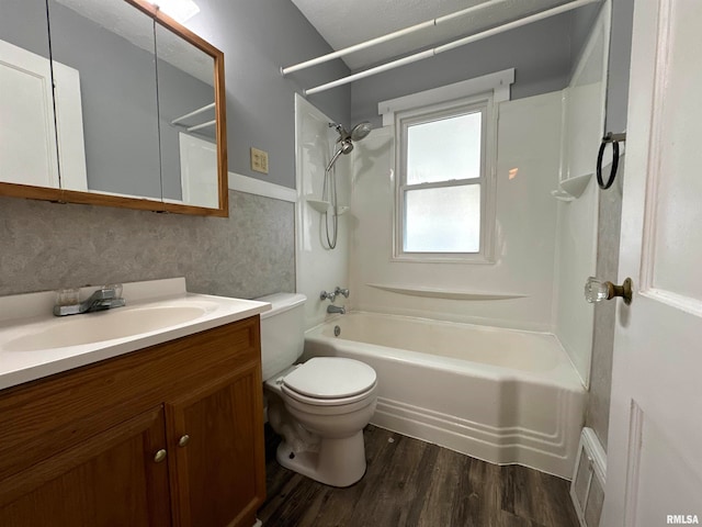 full bathroom with vanity, shower / washtub combination, toilet, and wood-type flooring