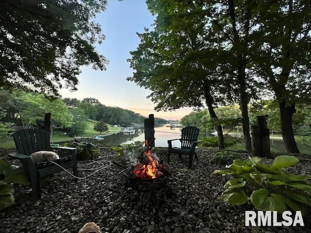 surrounding community featuring a water view