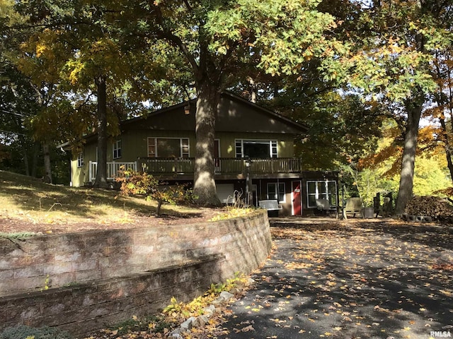 view of front of house with a deck