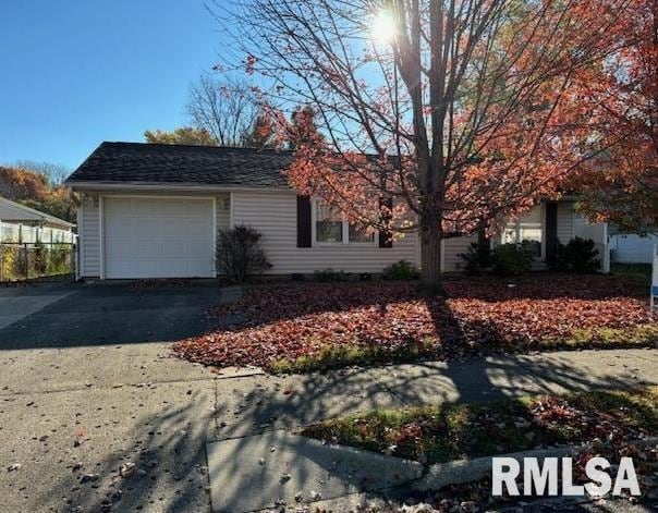 view of property exterior featuring a garage