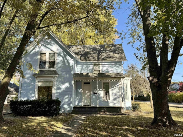631 S Mcarthur St, Macomb, IL 61455 - victorian-style house featuring a porch and a shingled roof