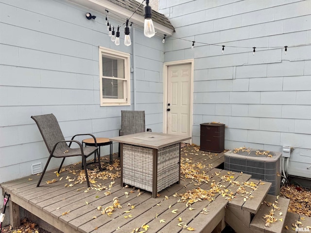 wooden terrace with central air condition unit