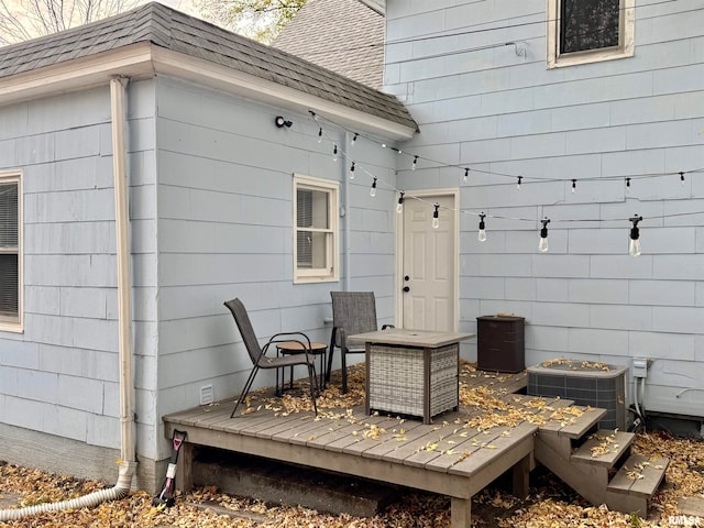 wooden terrace with central air condition unit