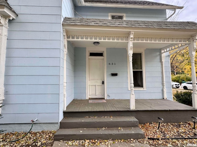 property entrance with covered porch