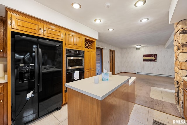 kitchen with a center island, black appliances, a baseboard radiator, and light colored carpet