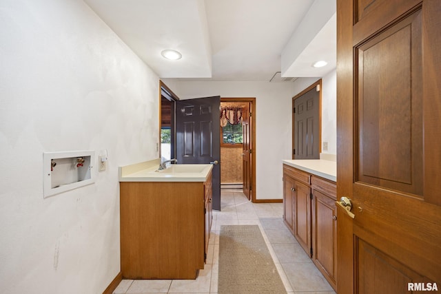 bathroom with vanity and tile patterned flooring