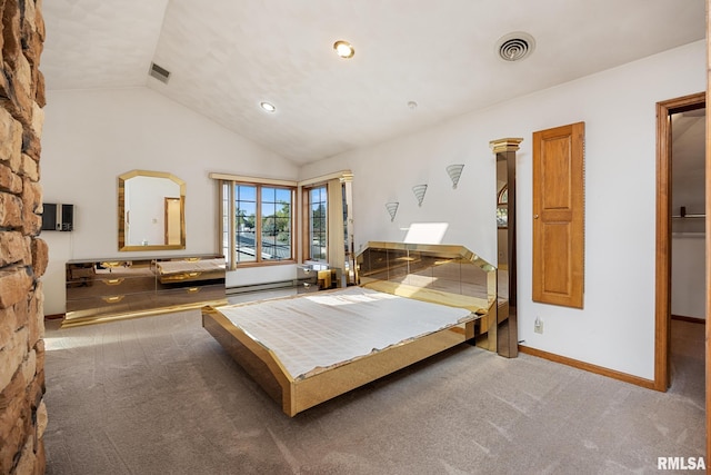 carpeted bedroom featuring vaulted ceiling