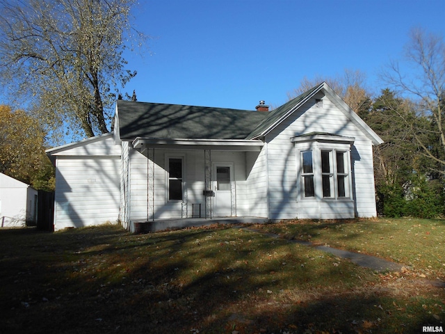 view of front facade with a porch and a front yard