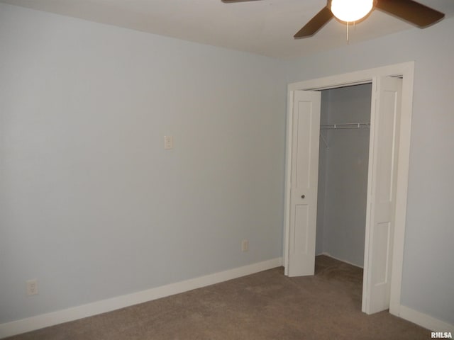 unfurnished bedroom featuring carpet floors, a ceiling fan, baseboards, and a closet