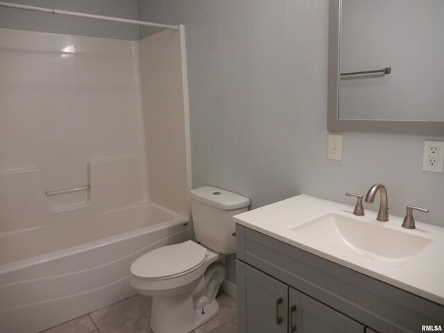 full bathroom with vanity, toilet, shower / washtub combination, and tile patterned flooring