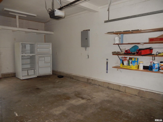 garage featuring electric panel and a garage door opener